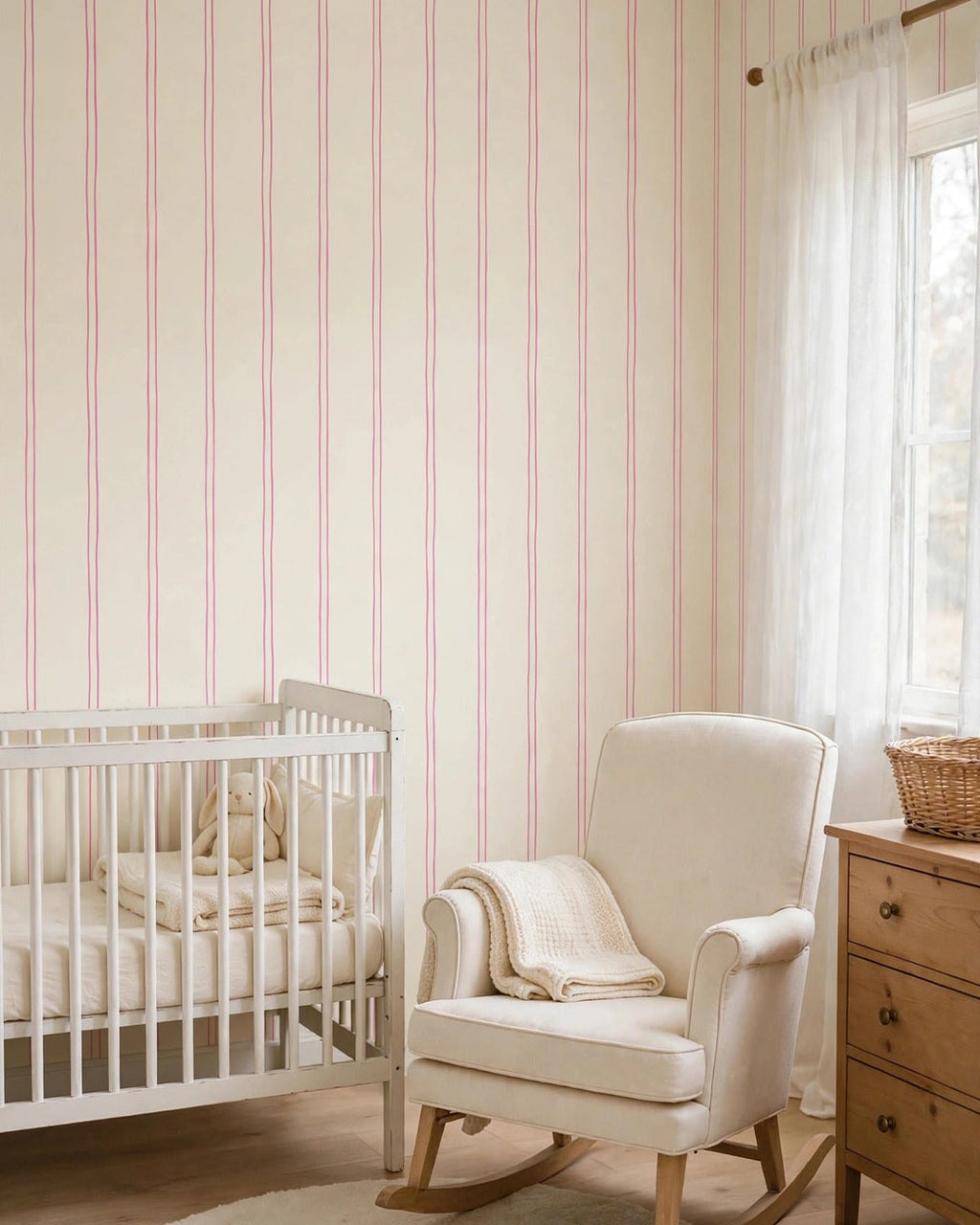 Pink Pinstripe Wallpaper in a cream nursery